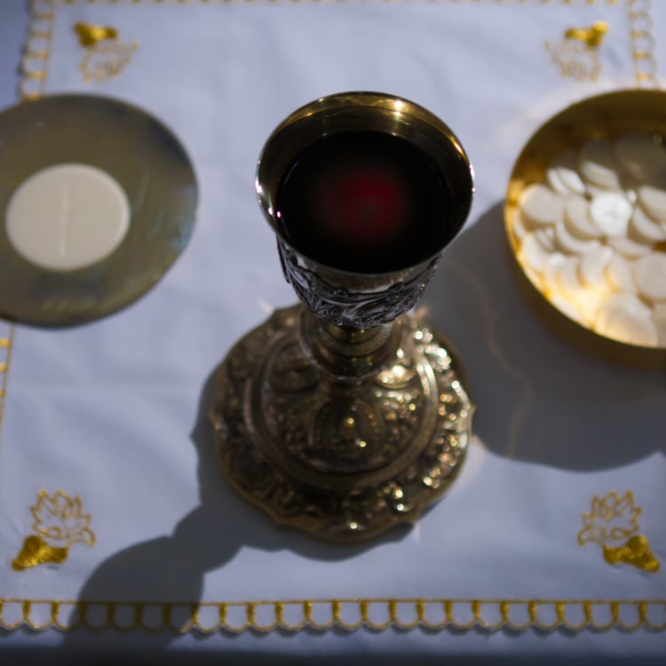 Chalice Large Host and Ciborium on the Altar